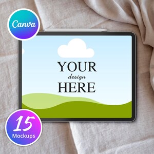 Puede incluir: Una tableta blanca con un fondo de cielo azul y colinas verdes. El texto "YOUR design HERE" se muestra en la pantalla. La tableta está sobre una superficie de tela blanca.