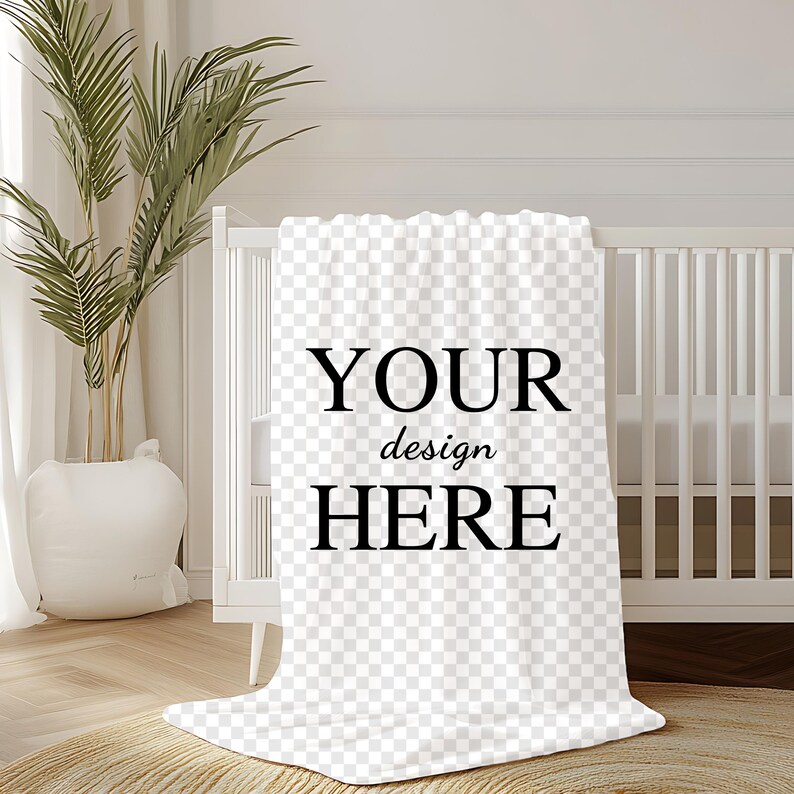 May include: White baby blanket with the text "YOUR design HERE" printed in black.
