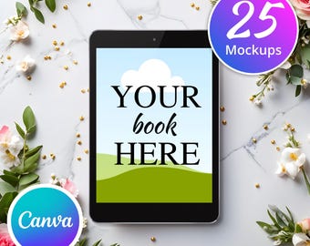 May include: A black tablet computer mockup with a white background and the text "YOUR book HERE" on the screen. The tablet is surrounded by white flowers and gold glitter on a marble surface. The text "25 Mockups" is visible in a purple and blue circle in the upper right corner of the image.