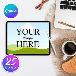May include: A digital tablet with the words "YOUR design HERE" on the screen, a stylus, and a "Canva" logo. The image also includes a laptop, coffee, and cinnamon sticks, suggesting a workspace or design mockup.