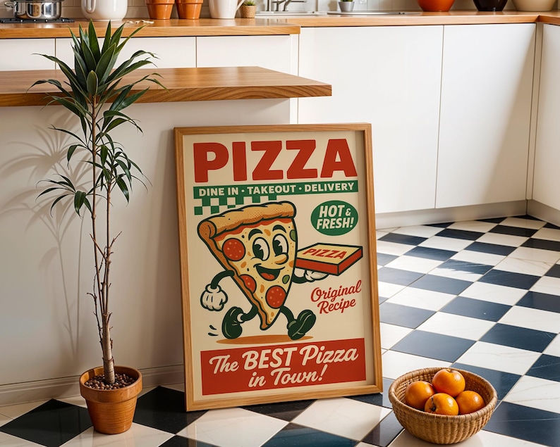May include: A framed vintage-style pizza advertisement. The poster features a cartoon pizza slice holding a pizza box, with the words "PIZZA" and "The BEST Pizza in Town!". The background includes a plant in a terracotta pot and a basket of oranges.