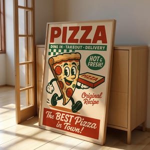 May include: A framed vintage-style pizza advertisement. The poster features a cartoon pizza slice with a smiling face, holding a pizza box. Text includes "PIZZA", "Dine In, Takeout, Delivery", "Hot & Fresh!", "Original Recipe", and "The BEST Pizza in Town!"