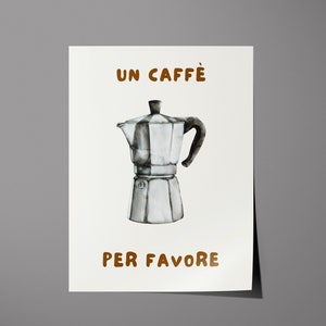 May include: A white and silver Moka pot with a brown handle, on a white background. The text "UN CAFFE'" and "PER FAVORE" is printed in brown letters.