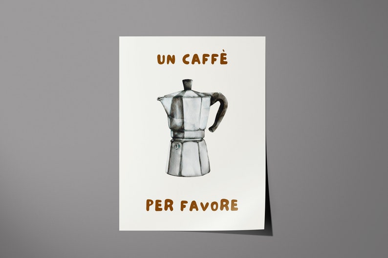 May include: A white and silver Moka pot with a brown handle, on a white background. The text "UN CAFFE'" and "PER FAVORE" is printed in brown letters.