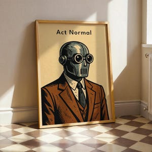 May include: Framed art print featuring a robot-like figure in a suit, with the text "Act Normal" at the top. The robot has goggles and a metallic face. The suit is brown with a black tie. The background is a light tan color.