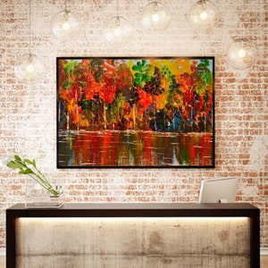 May include: A painting of a colorful autumn forest reflected in a still lake. The trees are a mix of red, orange, yellow, and green. The lake is a deep blue with reflections of the trees.