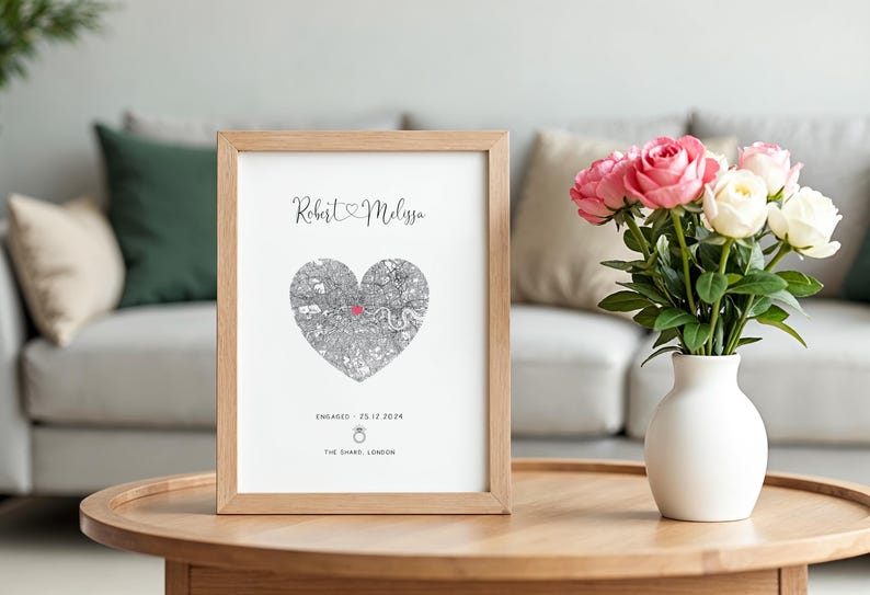mdf wrapped oak effect frame with a black and white map of where the couples special ocassion took place (engaged or married). Their names in a swirly text at the top and underneath the photo is the special occasion date and location written