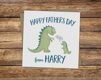 May include: A white card with a green dinosaur and a smaller green dinosaur. The text on the card reads "Happy Father's Day from HARRY" and "RAWR!" in a speech bubble.