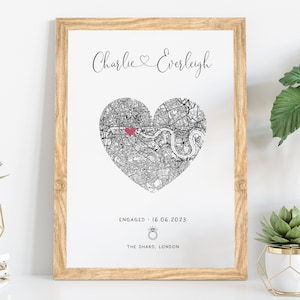 mdf wrapped oak photo frame with a black and white map of where the couples special ocassion took place (engaged or married). Their names in a swirly text at the top and underneath the photo is the special occasion date and location written