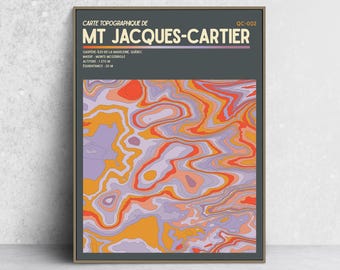 May include: A rectangular wall art print featuring a topographic map of Mt Jacques-Cartier. The design displays wavy, abstract contour lines in shades of orange, yellow, and light purple against a dark gray background with white text.