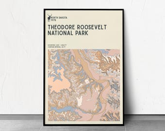 May include: A framed poster featuring a topographic map of Theodore Roosevelt National Park in North Dakota. The poster includes the park's name, elevation details, and contour interval. The map uses a palette of beige, pink, blue, and brown.