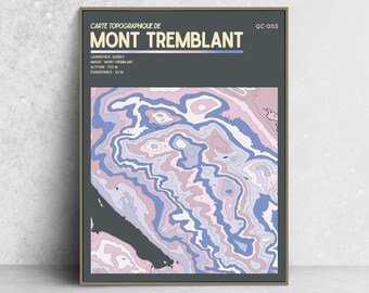 May include: A rectangular wall art print featuring a topographic map of Mont Tremblant. The design includes a dark gray header with the text "CARTE TOPOGRAPHIQUE DE MONT TREMBLANT" and "QC-005". The map displays wavy contour lines in shades of pink, purple, and blue.
