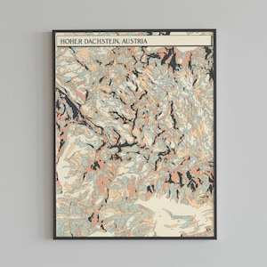 May include: A framed art print featuring a topographic map of Hoher Dachstein, Austria. The map uses a palette of muted colors including peach, beige, and blue, with black contour lines. The title "HOHER DACHSTEIN, AUSTRIA" is printed at the top.