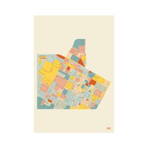 May include: A colorful, abstract map print featuring a variety of shapes and colors, including yellow, blue, and red. The print has the text "USC" in the bottom right corner. The map is set against a cream-colored background.