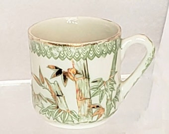 Lovely Little Miniature Demitasse Flat Cup Decorated With Bamboo And Gold Accents