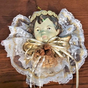 Victorian-style Porcelain Angel Cherub Head With Lace, Ribbon and Dried Flowers