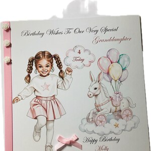 May include: A birthday card with a cartoon illustration of a young girl in a pink skirt and white top. The card includes text that reads "Birthday Wishes To Our Very Special Granddaughter" and "Happy Birthday Molly."