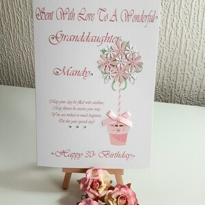 May include: A pink and white card with a flower bouquet design and the text "Sent With Love To A Wonderful Granddaughter Mandy. May your day be filled with sunshine, May flowers be strewn your way You are wished so much happiness, On this your special day! Happy 30th Birthday."