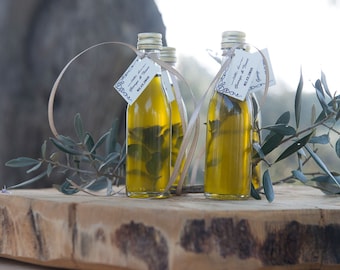 Recuerdos de aceite de oliva griego con infusión de romero, minibotellas de vidrio