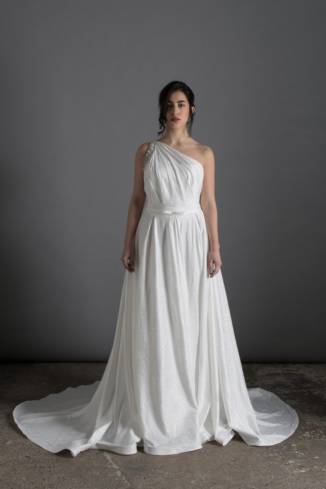 open lace back dress BRING THE DRAMA ONE SLEEVE FEATHER DRESS – AKIRA main image 1