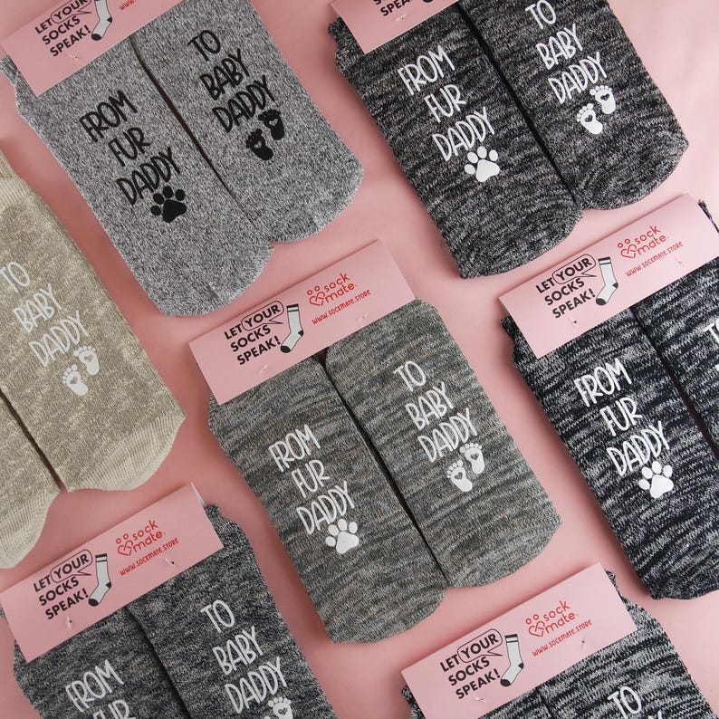 Cute gift socks for new dads with pets, featuring 'From Fur Daddy to Baby Daddy' in white lettering