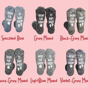 Funny dad-to-be socks with paw prints and baby feet, ideal for pet owners becoming new dads