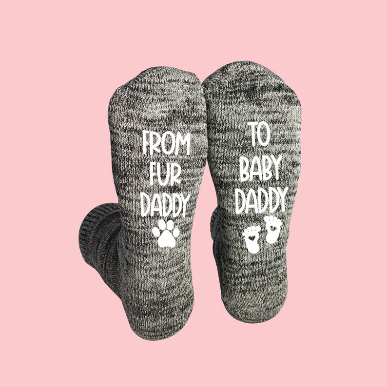 Black gray cotton socks for men with dog and baby symbols and 'From Fur Daddy to Baby Daddy' printed on sides