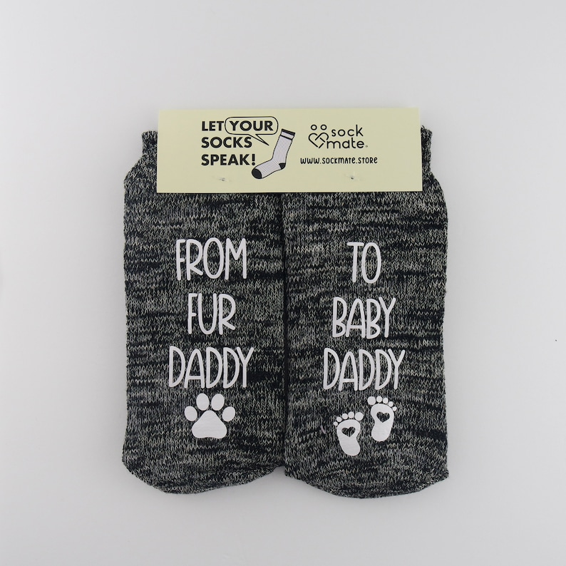 gray cotton socks for men with dog and baby symbols and 'From Fur Daddy to Baby Daddy' printed on sides