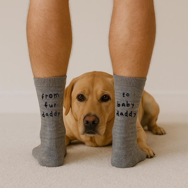 Speckled blue cotton socks for men with dog and baby symbols and 'From Fur Daddy to Baby Daddy' printed on sides