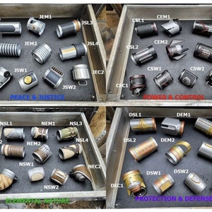 May include: A display of 12 different lightsaber hilt designs, each with a unique color scheme and design. The hilts are arranged in four rows of three, with each row labeled with a different theme: Peace & Justice, Power & Control, Elemental Nature, and Protection & Defense.