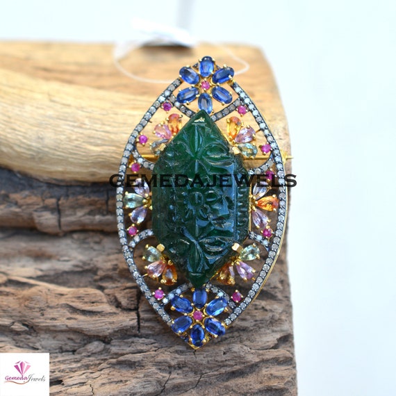 Gemstone brooch deals