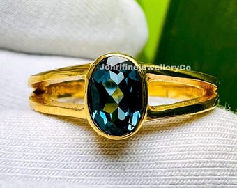 London Blue Topaz Ring: Oval Gemstone, Rose Gold Sterling Silver