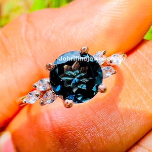 London Blue Topaz Ring: 14K Rose Gold Plated Sterling Silver