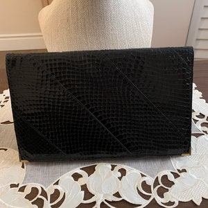 Clutch vintage de piel de serpiente y cuero