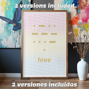May include: A rectangular framed wall art print featuring a gradient background transitioning from pink to yellow to blue. The center displays gold Morse code symbols and the word love in gold text. The text 2 versions included appears twice.