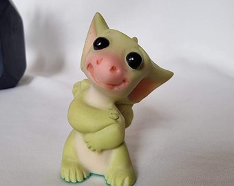 Whimsical world of Pocket Dragon, Pocket Dragon holding a hug, Pocket Dragon Figurine, Real Musgrave