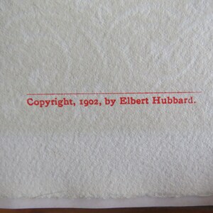 May include: Close-up of a red copyright notice that reads "Copyright, 1902, by Elbert Hubbard."