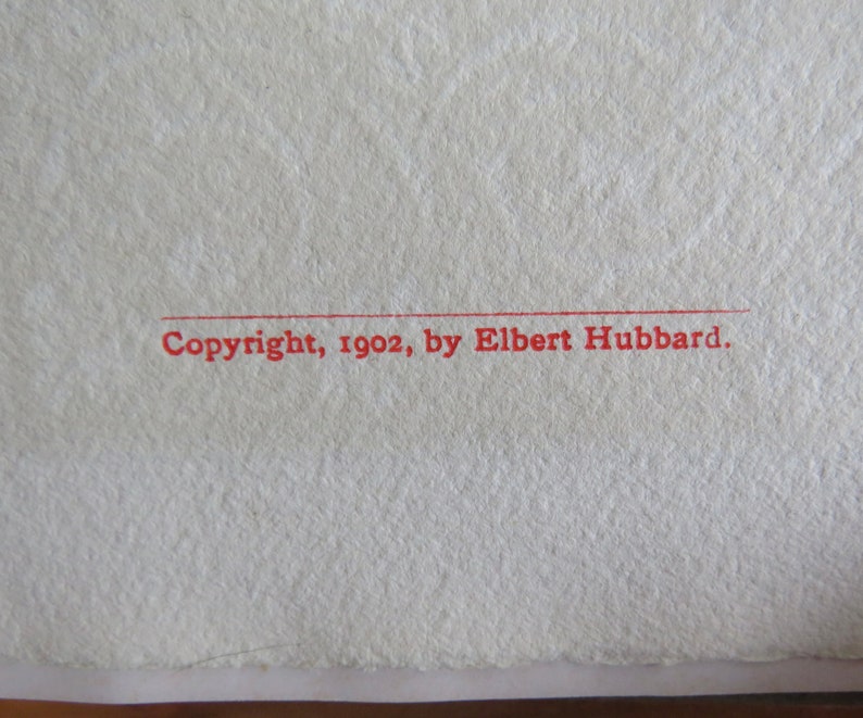 May include: Close-up of a red copyright notice that reads "Copyright, 1902, by Elbert Hubbard."