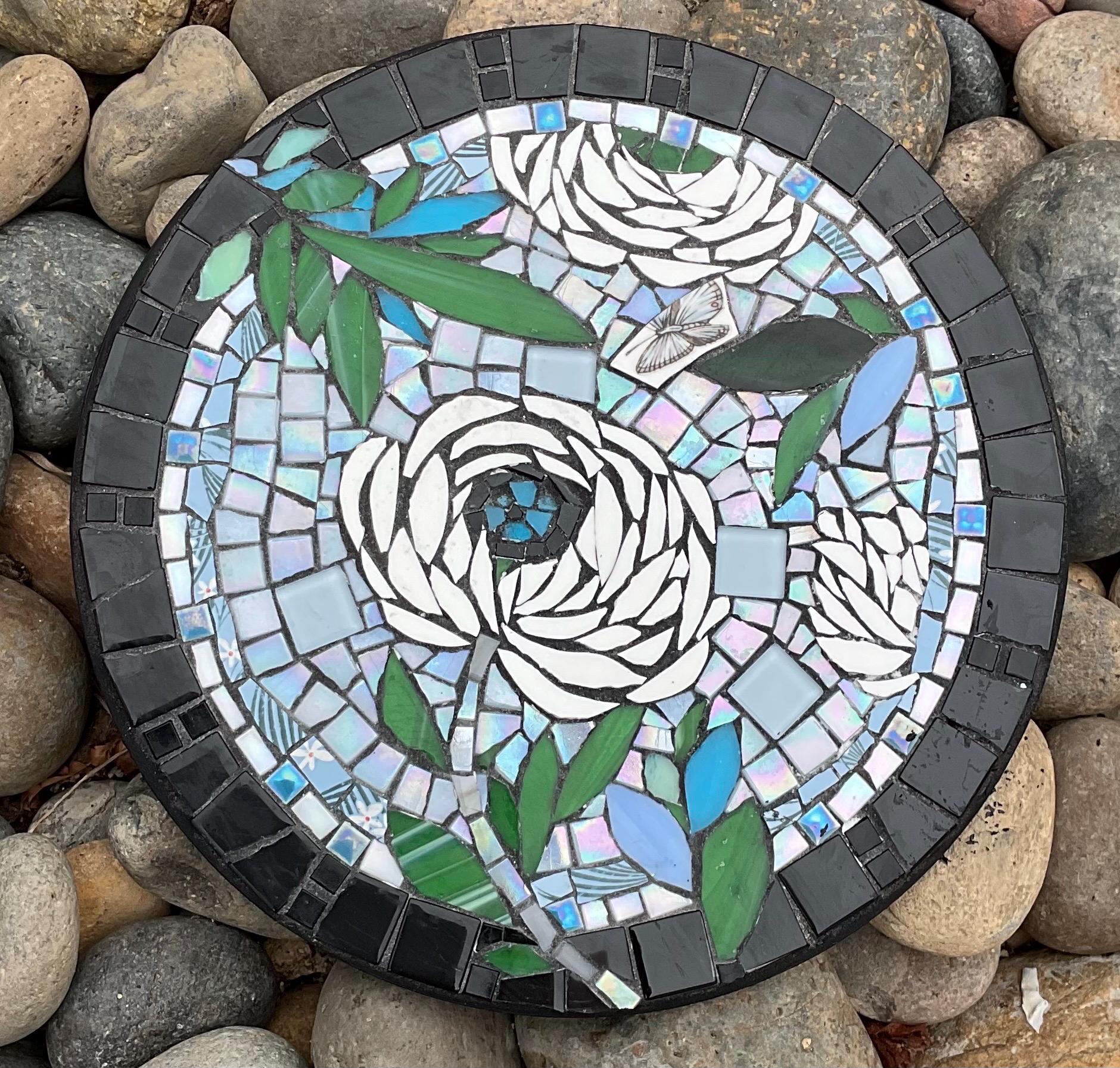 Handmade Mosaic table top, garden decor, 13" round. Blue, black, florals, leaves. Mixed media, glass, ceramics, broken dishes, iridescent