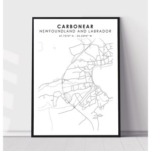 May include: A black and white line art map of the city of  Carbonear, Newfoundland and Labrador, Canada. The map shows the streets and roads of the city. The coordinates 47.7375° N - 53.2295° W are printed below the city name.