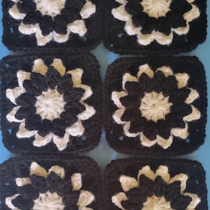 May include: A white ceramic mug with a black handle and the text "But First, Coffee" in a black, bold font. The mug is on a white surface. The mug is 4 inches tall.