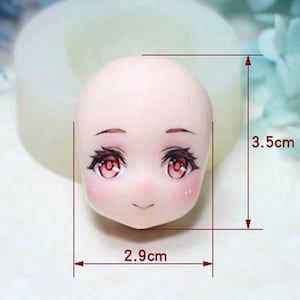 Peut inclure: Moule en silicone pour faire un visage de style anime avec de grands yeux et un sourire, mesurant 2,9 cm sur 3,5 cm.
