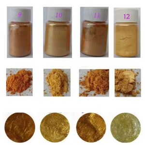May include: Four small jars of gold pigment powder, labeled 9, 10, 11, and 12. Each jar contains a different shade of gold powder, ranging from light to dark. The powder is shown in its original form, as well as in a pile and in a small, round, wet sample.