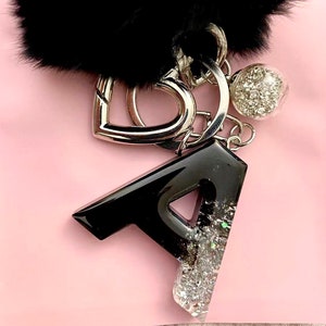 First resin keychain car letters personalized gifts birthday black silver leaf fur pompom craft in Germany