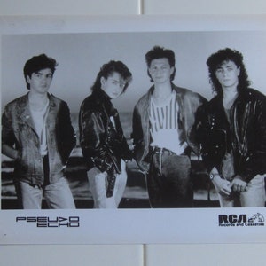 May include: Black and white promotional photo of a band called "FREELAB" with the RCA Records logo in the bottom right corner.