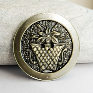 Vintage Green Celluloid Sew-Through Button Depicting a Tazza Urn
