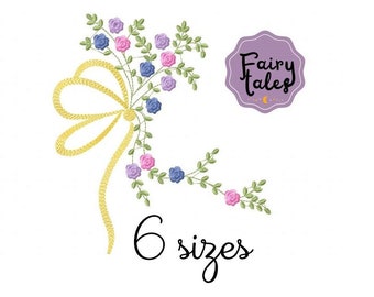 May include: Embroidered design of a floral bouquet with a yellow bow, in shades of pink, purple, and green. The design includes the text "Fairy Tales" and "6 sizes".