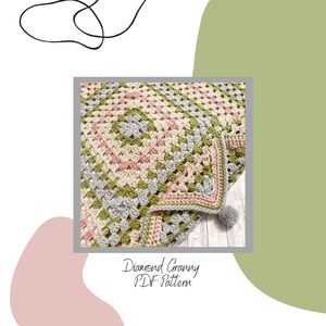 May include: A crocheted blanket featuring a granny square design in pink, green, grey, and cream. The blanket has a pink border and a grey pom-pom. The text "Diamond Granny PDF Pattern" is at the bottom.
