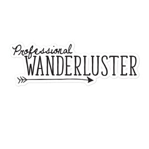May include: A white sticker with black text that reads "Professional Wanderluster." The word "Professional" is in a cursive font, while "Wanderluster" is in a bold, sans-serif font. An arrow points to the right under the word "Wanderluster."