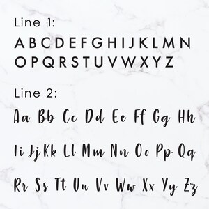 May include: A black and white alphabet chart with uppercase and lowercase letters. The letters are arranged in two rows. The first row shows the uppercase letters A through Z. The second row shows the lowercase letters a through z.